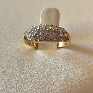 Gold plated ladies dress ring with white stone cluster. Size 4.5